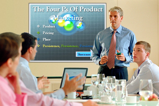 Employees run through the presentation that will eventually jump right off the screen.